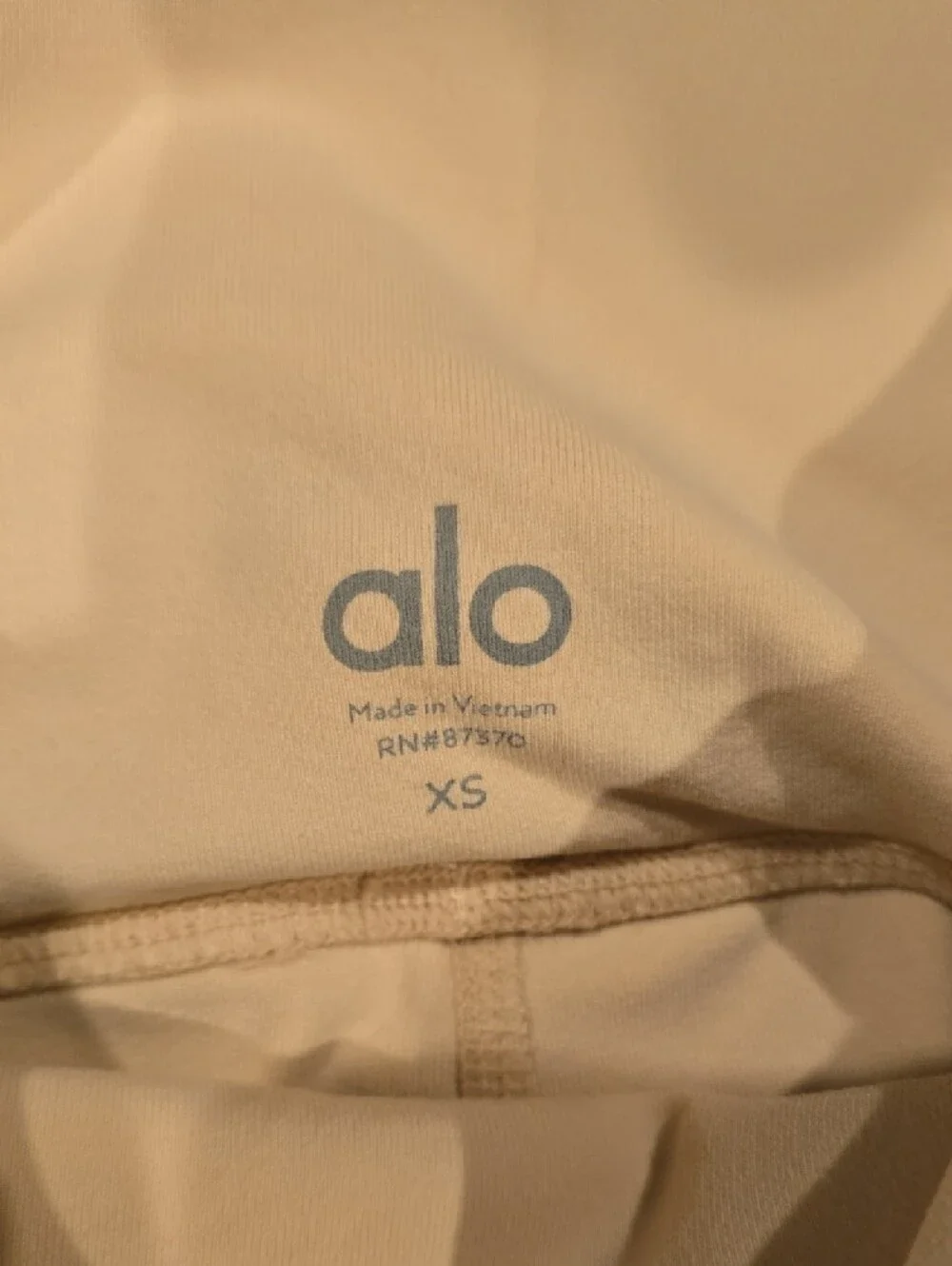 ALO Yoga High-Rise Leggings in Light Nude/blush